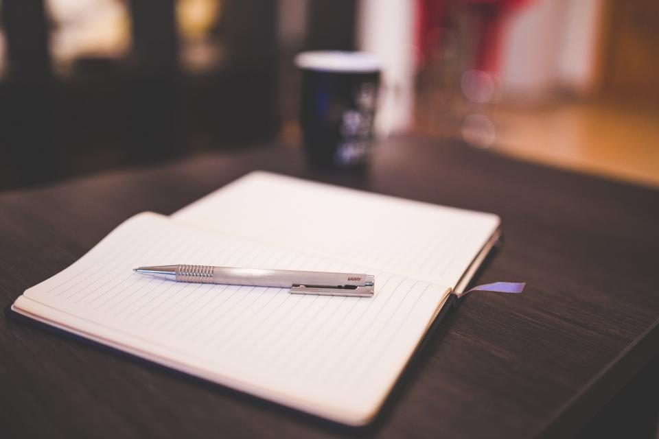 Illustrative photograph of pen Notebook